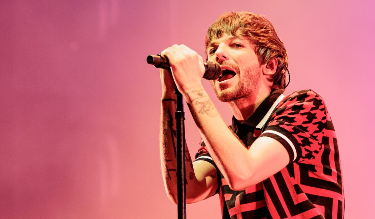 Louis Tomlinson says having the most writing credits in One Direction makes him feel “important” img