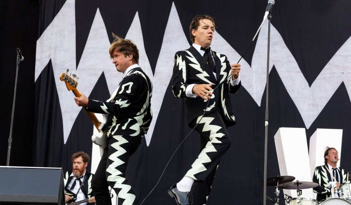 Watch The Hives join band covering them in the street outside Liverpool signing session img