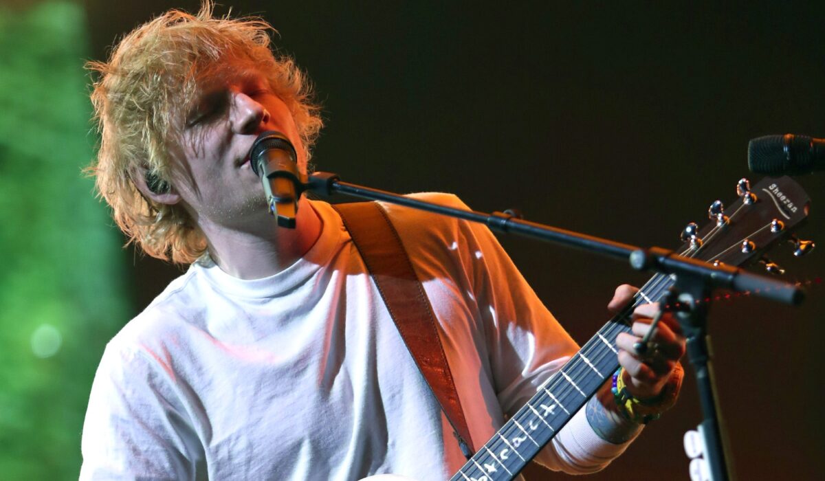 Ed Sheeran gets serenaded by his hometown soccer team img