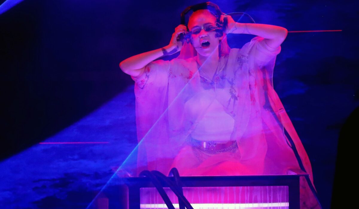 Grimes DJs at event calling for looser AI regulations but “disagrees with the sentiment of this party” img