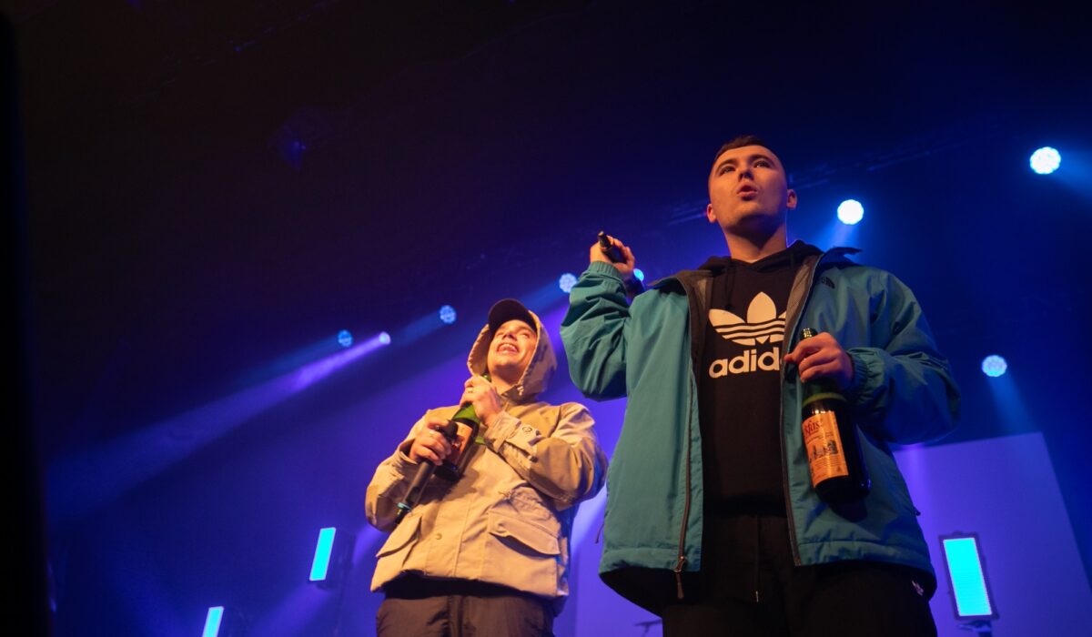 Watch Kneecap carry out Grian Chatten collab ‘Higher Manner To Dwell’ and discuss controversy on Eire’s ‘Late Late Present’ img